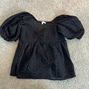 Babydoll black tee size medium. Never worn, brand new